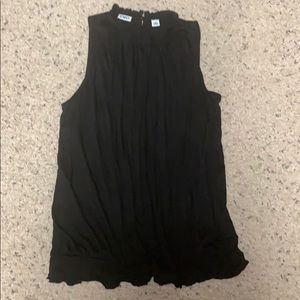 Black sleeveless blouse- goes with polka dot skirt